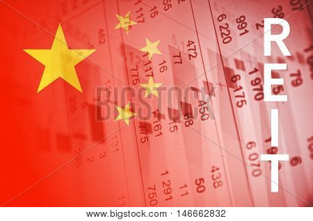 Inscription REIT. China flag, with the financial data in the background.