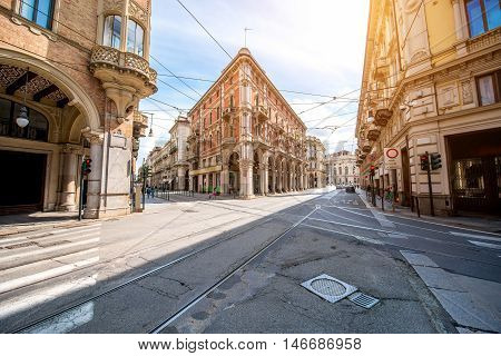 Central street with beautiful buildings in Turin city in Piedmont region in Italy