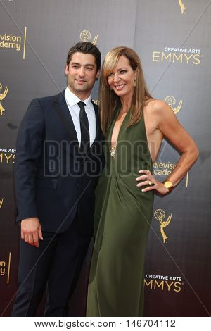 LOS ANGELES - SEP 10:  Philip Joncas, Allison Janney at the 2016 Creative Arts Emmy Awards - Day 1 - Arrivals at the Microsoft Theater on September 10, 2016 in Los Angeles, CA