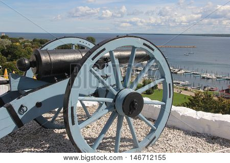 A cannon sits over the Straits of Mackinac, Michigan