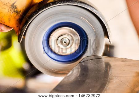 Cutting Steel With Angle Grinder At Car Service