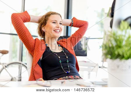 Young woman in office