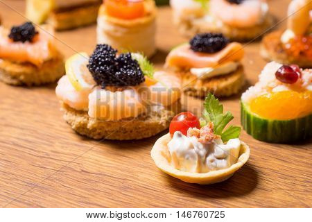 Exquisite selection of luxury canapes appetizer ready to be served for events celebrations or other occasion