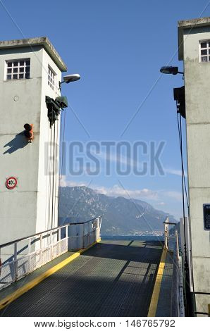 Entrance to the ferry, open gate for car