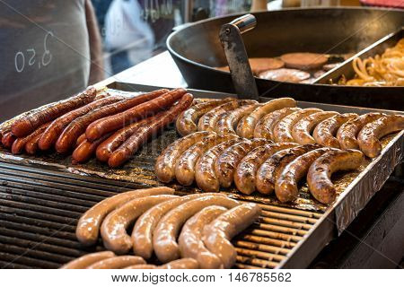 Grilling German sausages on sausage market (wine festival) in Bad Duerkheim, Germany