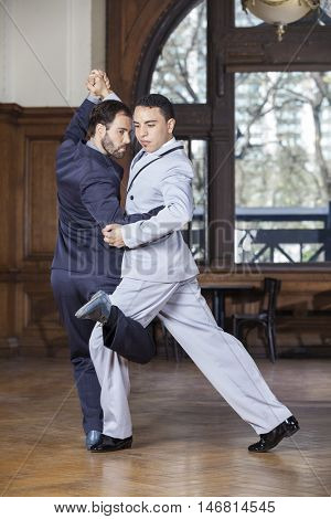 Tango Dancers Performing Gancho Step