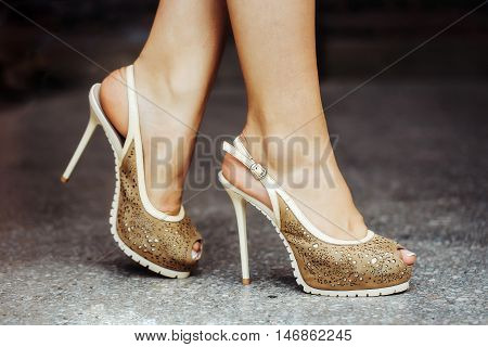 beige shoes female fancy high heel pumps strappy sandals on woman legs beautiful feet