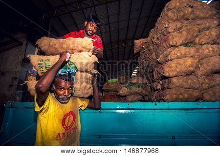 DAMBULLA SRI LANKA - FEBRUARY 17 2016: A typical market scene in Dambulla Sri Lanka. This place is the biggest fruit and vegetable exchange on island.