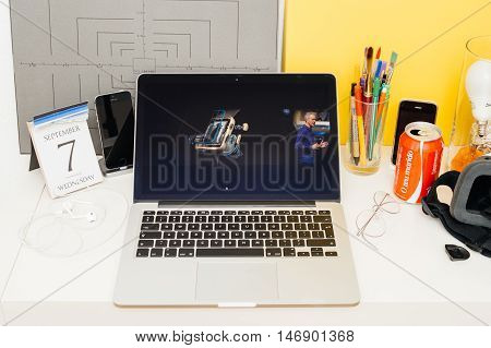 PARIS FRANCE - SEP 8 2016: Apple Computers website on MacBook Retina in room environment showcasing live coverage of Apple Keynote - Apple COO Jeff Williams on stage about waterproof apple watch
