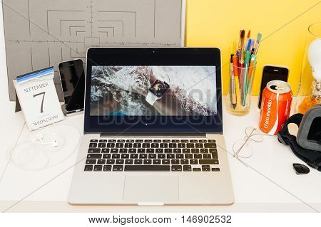 PARIS FRANCE - SEP 8 2016: Apple Computers website on MacBook Retina in room environment showcasing live coverage of Apple Keynote - Apple COO Jeff Williams on stage about waterproof Apple Watch series 2