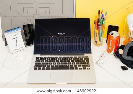 PARIS FRANCE - SEP 8 2016: Apple Computers website on MacBook Retina in room environment showcasing live coverage of Apple Keynote - Apple COO Jeff Williams on stage about waterproof Apple Watch series 2