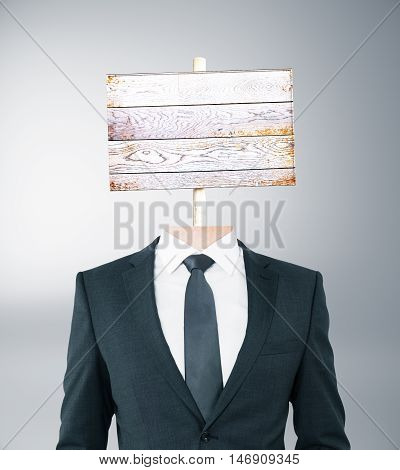 Wooden Signboard Headed Businessman