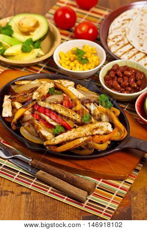Chicken Fajitas with Grilled Onions and Bell Peppers. Selective focus.