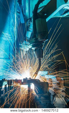 Welding robots movement in a car factory