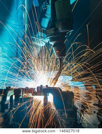 Welding robots movement in a car factory
