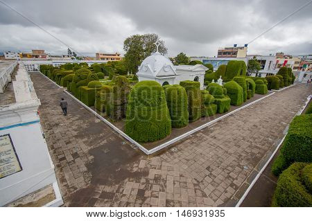 TULCAN, ECUADOR - JULY 3, 2016: overview of some sculptures located at the entrance of the cemetery.
