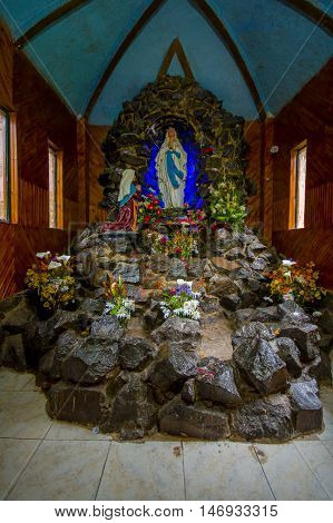 PASTO, COLOMBIA - JULY 3, 2016: virgen de lourdes it is located in a small sanctuary in la cocha lake near to the city of pasto.