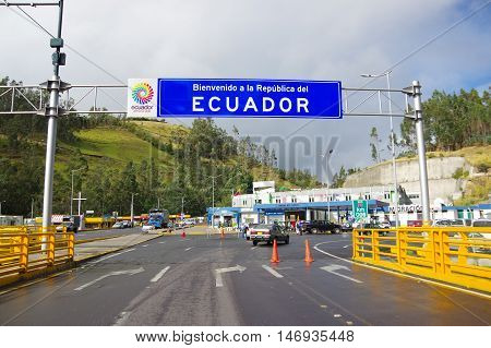 IPIALES, COLOMBIA - JULY 4, 2016: some cars driving trough the migration checkpoint in the border line between colombia and ecuador.