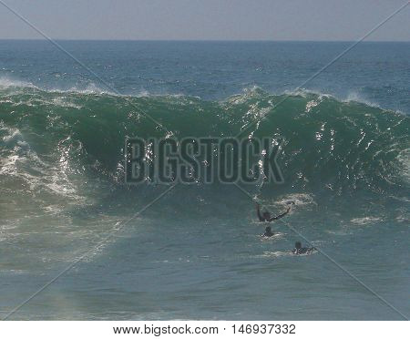 Unidentifiable body surfers gather at The Wedge in Newport Beach, CA during a big swell in September 2011.