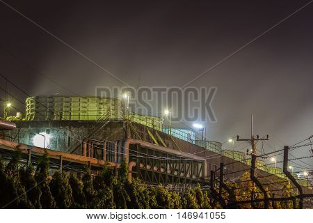 Cooling towers in oil refinery plant .
