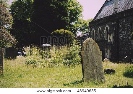 Grave Stones Outside A Church In Beaconsfield, Buckinghamshire, England Vintage Retro Filter.