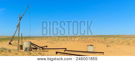 Old Sweep Well And Shadoof In Steppe.