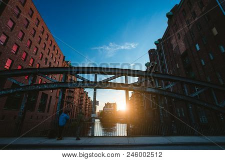 Photograph Capture Sunset On Massive Steel Construction Of Poggenmoehlenbruecke Bridge Near The Wass
