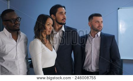 Portrait Of Business Team Standing In Office. Close Up. Professional
