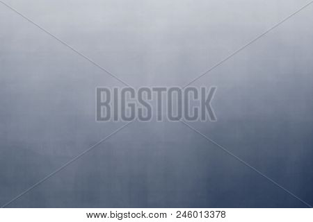 Tinted stained surface. Empty blue-gray textured background. 