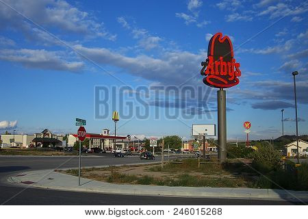 Douglas, Wyoming - October 1: Arbys And Mcdonalds Fast Food Signs Near The Interstate Highway On Oct