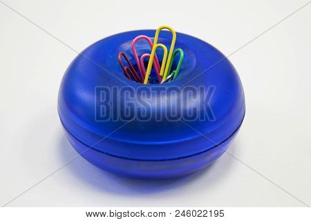 Bright Dispenser For Paper Clips. Stationery For Office.