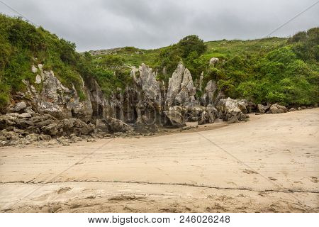 the famous beach gulpiyuri, in Asturias, Spain