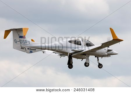 Raf Waddington, Lincolnshire, Uk - July 4, 2014: Diamond Da42 Mpp Aircraft G-dspy.