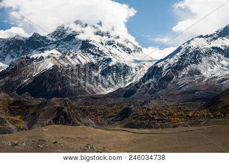 Landscape In The Mustang Region, Nepal. Thorong La Rangeview From A Place Near Kagbeni Village At An