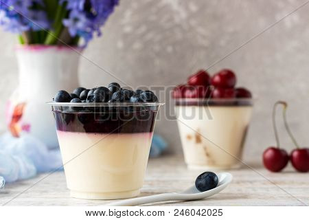 Italian Dessert Pana Cota With Berry Jam And Fresh Blueberries