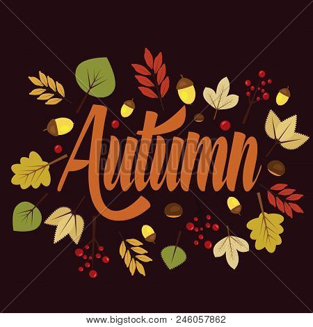 Written The Word Autumn With Yellow Leaves.