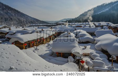 Snow Village At Sunny Day In Mohe County, Northernmost China.