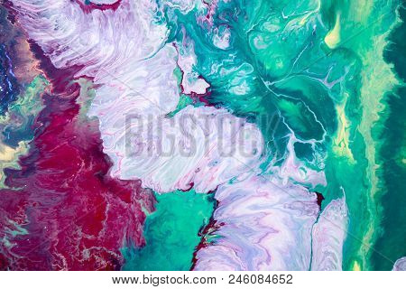 Abstraction Of The Flowing Multi-colored Acrylic Paints