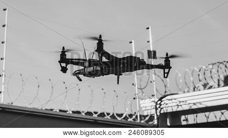 Black Homemade Drone Invading A Private Property. Drone Infringing The Privacy Of A Restrict Area Re