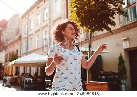 Beautiful Teen Girl Listening To The Music Walking Along Old City Streets And Dancing Happy Woman Ha