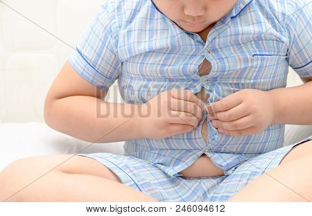 Child With Overweight,  Tight Shirt.