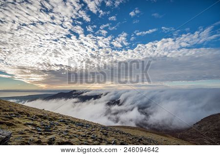 A Gorgeous Sunset View From Slieve Donard With Low Lying Clouds.
