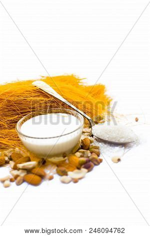 Close Up Of Raw Vermicelli Or Sevee Or Seviyan Or Seviyaan And Dry Fruits Isolated On White With A B