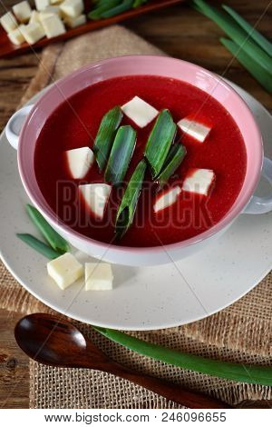 Beet Soup-puree Topped With Bryndza And Green Onion In A Ceramic Tureen