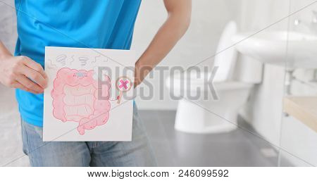 Man Take Intestine Billboard With Colorectal Cancer On The Toilet