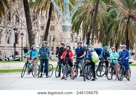 Barcelona - March, 2018: People On A Bike Tour In Barcelona Spain