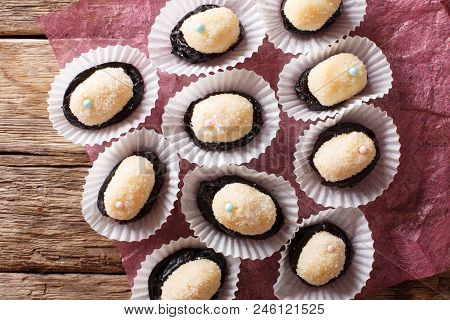 Authentic Brazilian Sweet Candies Olho De Sogra With Dried Plums Close-up. Horizontal Top View