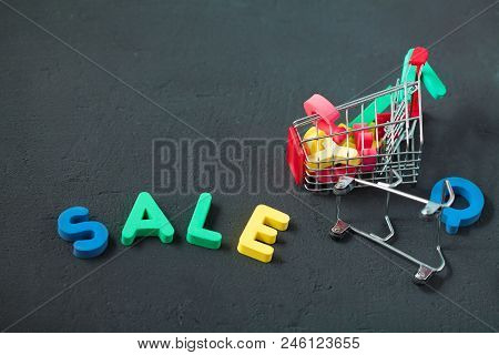 Bright Inscription Sale, Consumer Trolley With Letters. Sale, Discount, Black Friday Concept. Copy S