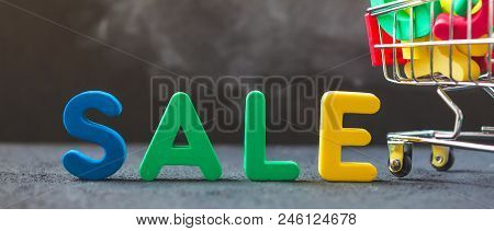 Sale, Discount, Black Friday Concept With Bright Inscription Sale On A Dark Background, Consumer Tro