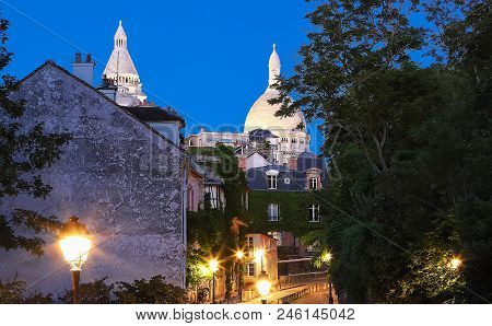 The Basilica Sacre Coeur Is A Roman Catholic Church Located At The Summet Of The Butte Montmartre , 